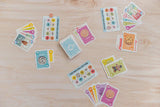 Collection of colorful cards on a wooden surface