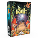 Board game box for 'Toil & Troublez' with a frog, mushrooms, and butterfly on the cover.