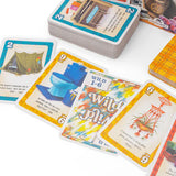 Colorful card game with various cards on a white surface