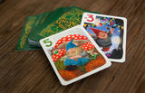 Gnome-themed playing cards on a wooden surface