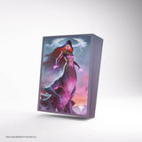 Cardboard box with a fantasy design featuring a character in a hooded robe against a colorful sky.