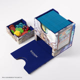 Card game components including a deck box, card sleeves, and dice on a white background.