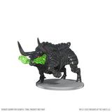 Black fantasy bull creature figurine with green accents on a white background