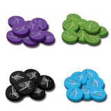 Set of round game pieces in purple, green, black, and blue on a white background