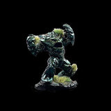 Statue of a creature with greenery on a black background