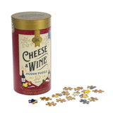 Jigsaw puzzle set with 'Cheese & Wine' theme packaging on a white background