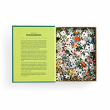 Jigsaw puzzle with houseplant-themed pieces and a green instruction leaflet.