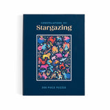 Puzzle box with colorful constellation design on a blue background