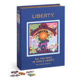 Puzzle box with colorful design and text 'All You Need is Love & Liberty' on a white background