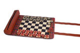 Checkered bag with red and black pieces on a white background