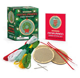 Wooden Christmas ornaments cross-stitch kit with packaging, threads, and needles on a white background