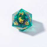 Translucent green polyhedral dice with gold numbering on a white background