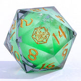 Green polyhedral dice with gold numbers on a white background