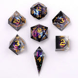 Set of polyhedral dice with galaxy design on a white background