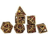 Set of ornate gold dice with red numbers on a white background