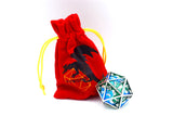 Red drawstring bag with a dragon design next to polyhedral dice on a white background