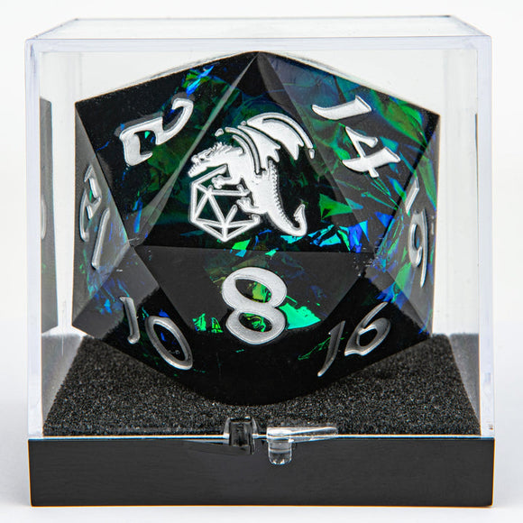 D20 dice with dragon design in a clear display case