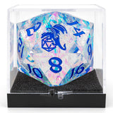 Holographic polyhedral dice set with blue numbers in a clear display case.