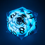 Glowing blue polyhedral dice with black numbering on a dark background