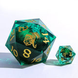 Green polyhedral dice with gold numbers on a white background