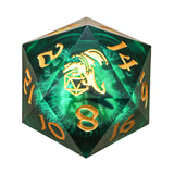 Green polyhedral dice with gold numbers and dragon design on a white background