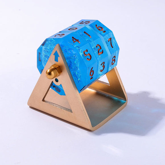Blue polyhedral die with gold stand on a white background