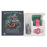 Box of Tricks with dice and game components on a white background