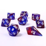 Set of polyhedral dice with blue and red marbled pattern on a white background