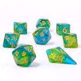 Set of colorful polyhedral dice with numbers on a white background