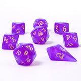 Purple polyhedral dice set with gold numbers on a white background