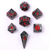 Set of gray dice with red numbers on a white background