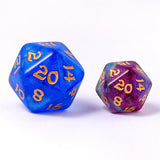 Two polyhedral dice, one blue and one multicolored, on a white background