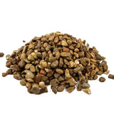 Pile of multicolored pebbles on a white background