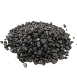 Pile of black gravel on a white background