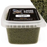 Container of olive green loose foliage with a label on a white background