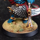 Detailed figurine of a warrior with armor and weapon on a textured base