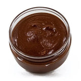 Jar of chocolate spread on a white background