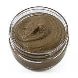 Jar of brown泥浆 on a white background