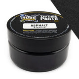 Black container of texture paste with 'Huge Minis' branding on a white background