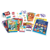 A colorful board game set arranged on a white background, including character cards, action cards, tokens, dice, and a blue player guide sheet.