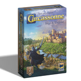 Board game box for 'Carcassonne Siege & Defense' with castle and warrior illustration on a blue background