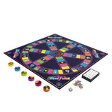 A colorful board game set labeled 'Omnipresent' and 'Tritool Pursuit' arranged on a white background, including a large circular game board, multiple colored spinner wheels, dice, and small accessory pieces.