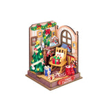Christmas-themed miniature room with festive decorations on a white background