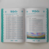 Open book showing pages with text and a colorful illustration on a white background
