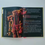 Open book showing a character illustration labeled 'The Engineer' on a white background