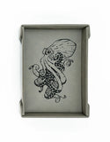 Decorative box with a black and white octopus design on a gray background