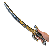 Decorative sword held by a hand on a white background