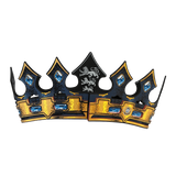 Decorative crown with blue gemstones and a central lion emblem on a white background