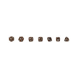 Six small brown polyhedral dice with metallic silver cutout details, arranged in a horizontal row on a plain white background.