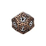 Metallic polyhedral dice with black engravings and white numbers on a white background